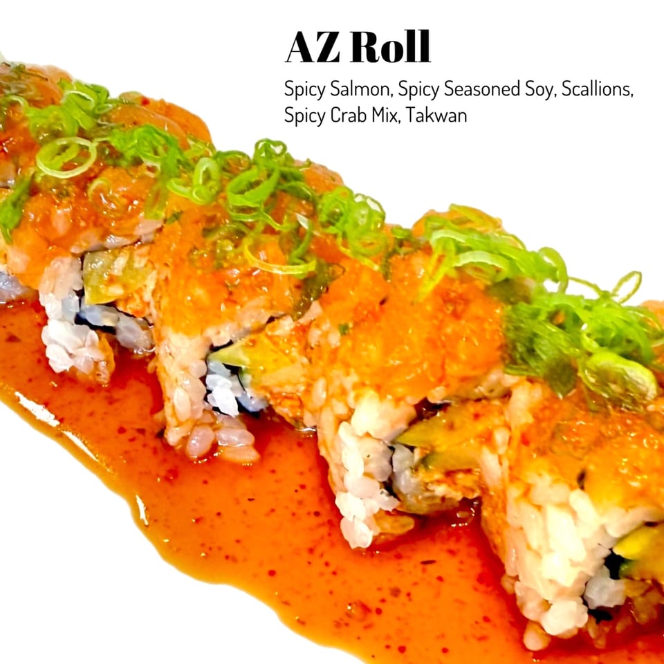 Sushi Friend's AZ Roll with spicy salmon, crab mix, scallions, and seasoned soy sauce.
