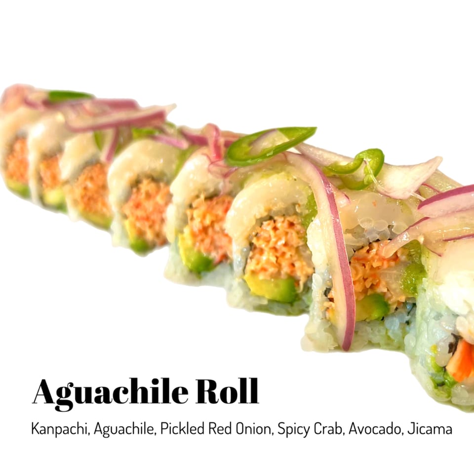 Aguachile sushi roll with kanpachi, spicy crab, avocado, jicama, pickled red onion, and aguachile.